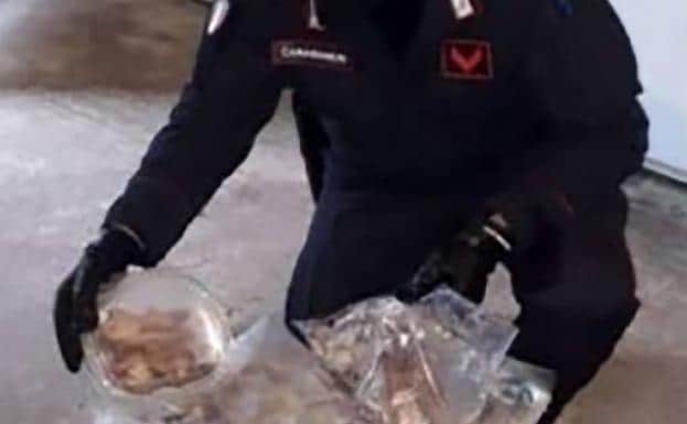 A carabinieri with food.