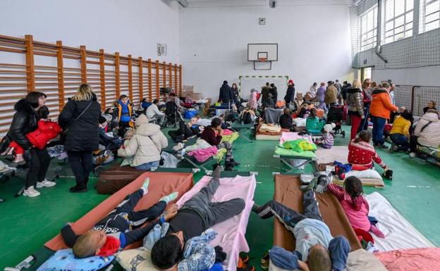 Ukrainian refugees rest at a local primary school in Hungary.
