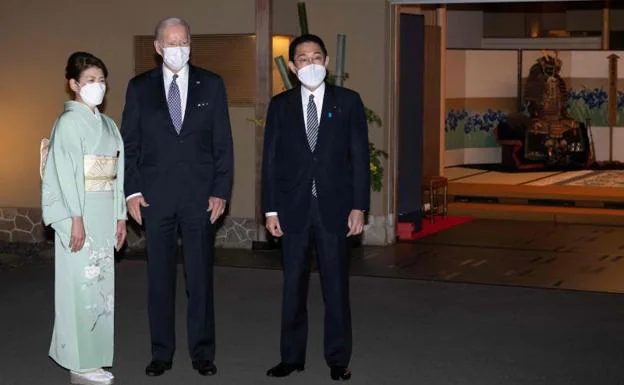 Biden meets in Tokyo with Japanese Prime Minister Fumio Kishida.
