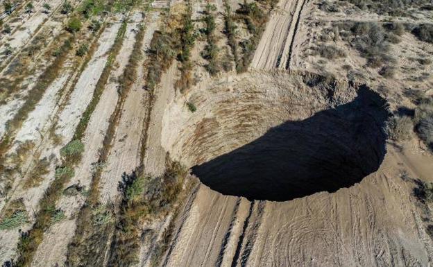 The huge sinkhole has a diameter of 32 meters and a depth of 64