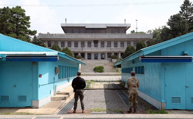 A South Korean and an American soldier guard the Panmunjom border post, which separates the two Koreas. 