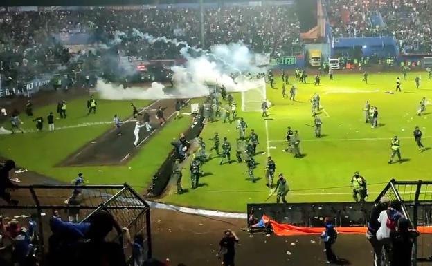 At least 129 killed in riots after a football match in Indonesia