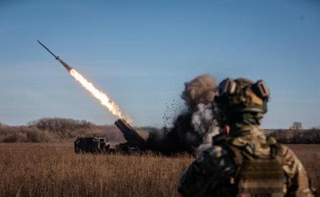 A Ukrainian battery fires missiles at Russian positions in Donetsk.